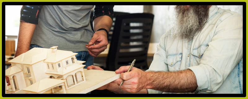 Architect presents model of building.